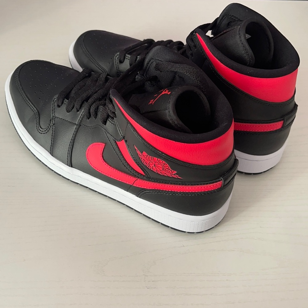 Authentic Women’s Black and Coral Jordan Sneakers.